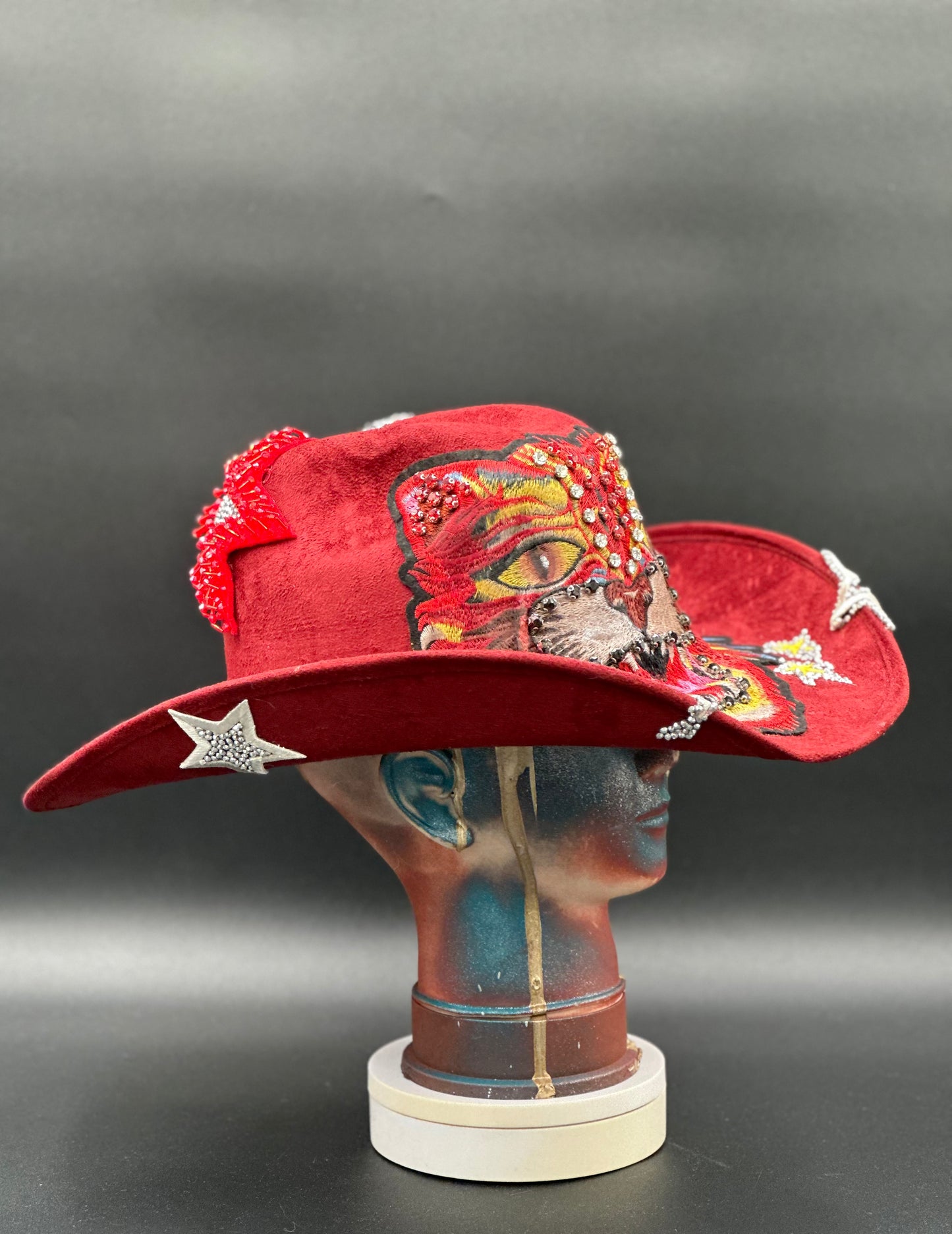 Close-up of the intricate tiger embroidery on the China - Red Suede Cowboy Hat.