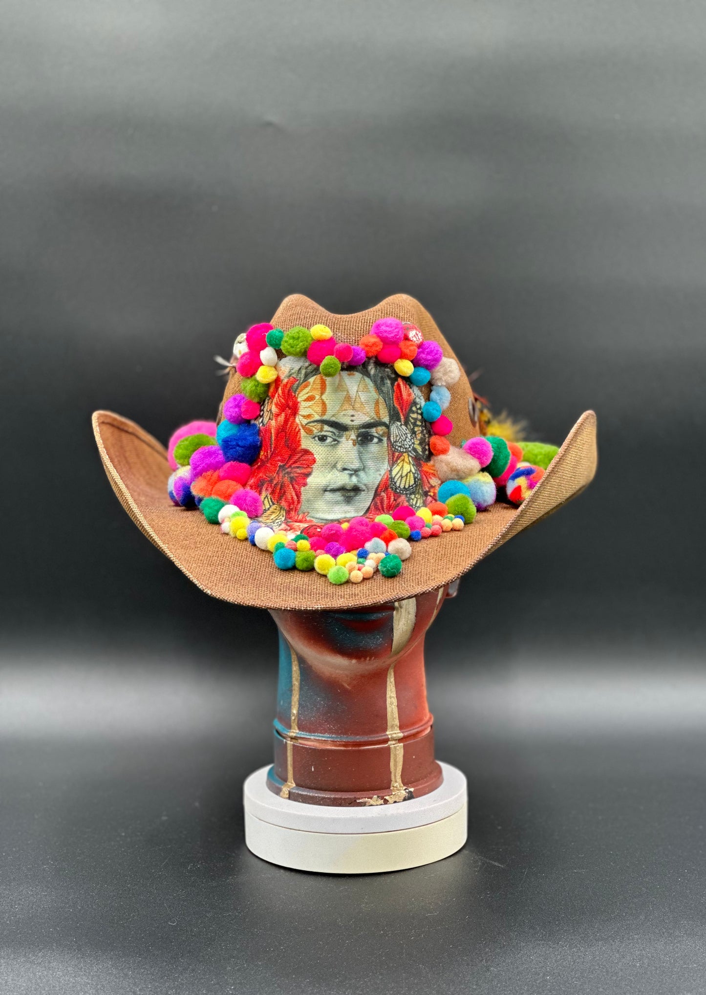Frida in Cotton - Brown Straw Cowboy Hat with a colorful design displayed on a mannequin head.