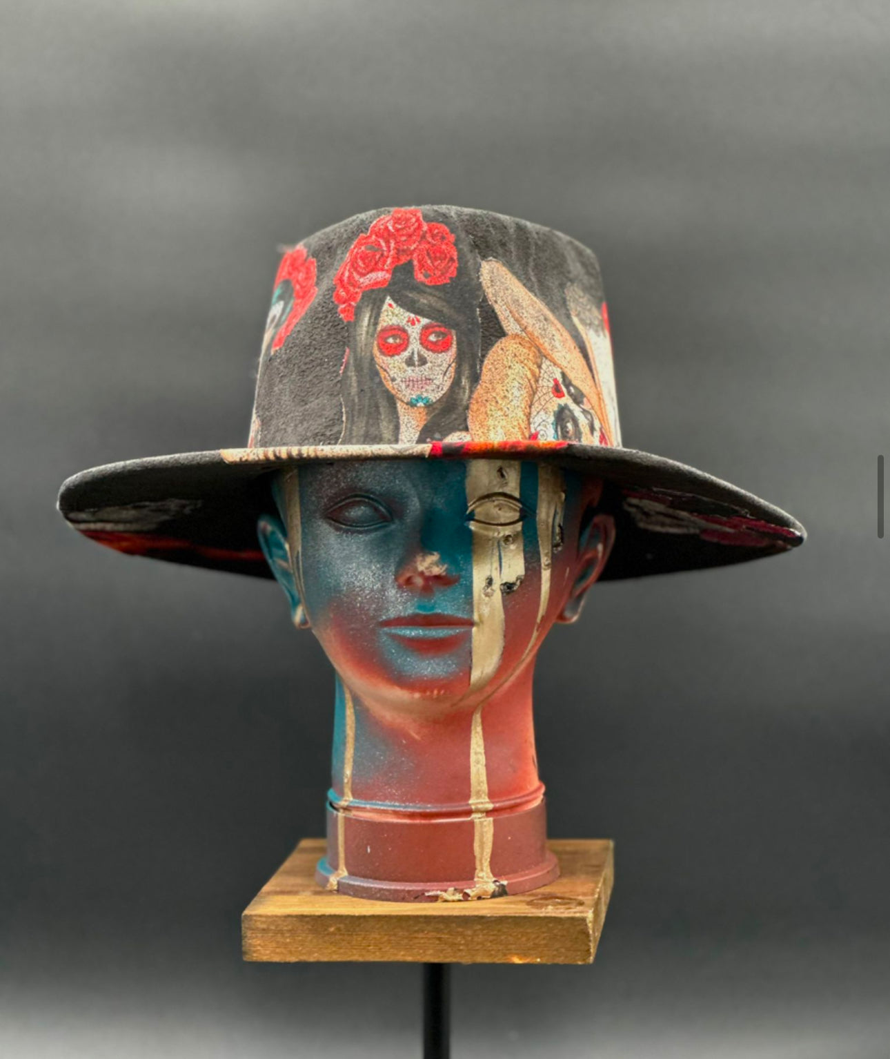 Mazatlán Black Suede Arrow Hat with a bold arrow design displayed on a mannequin head. Front view showing the hat's full design and shape.