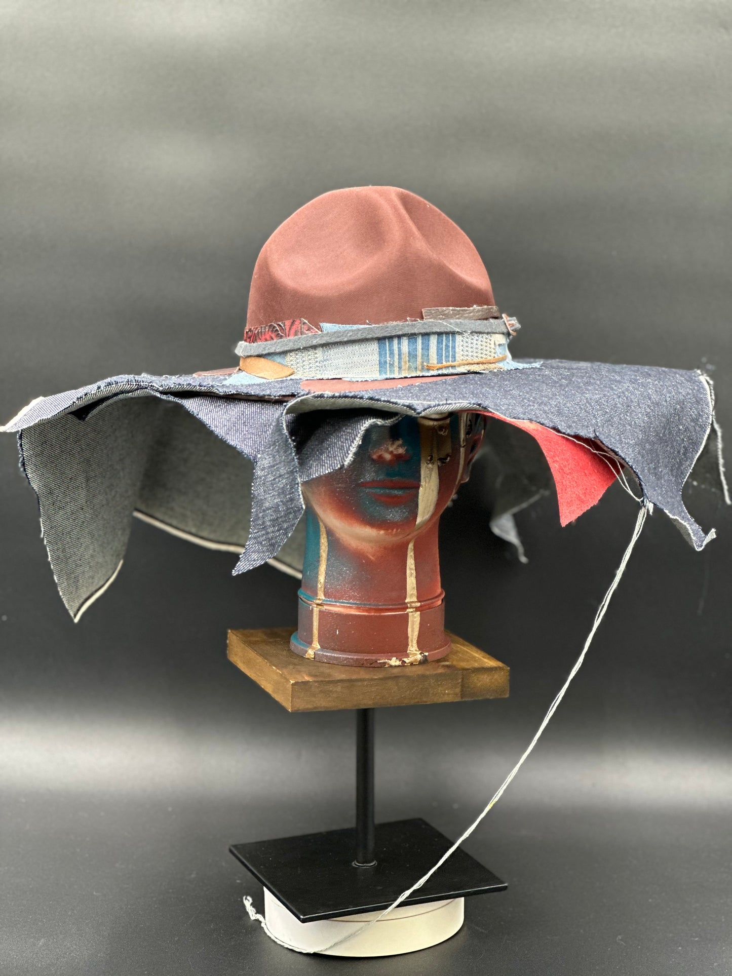 Totally Me Tobacco Ranger Hat with layered denim and leather, showing a wide brim and unique fabric textures.
