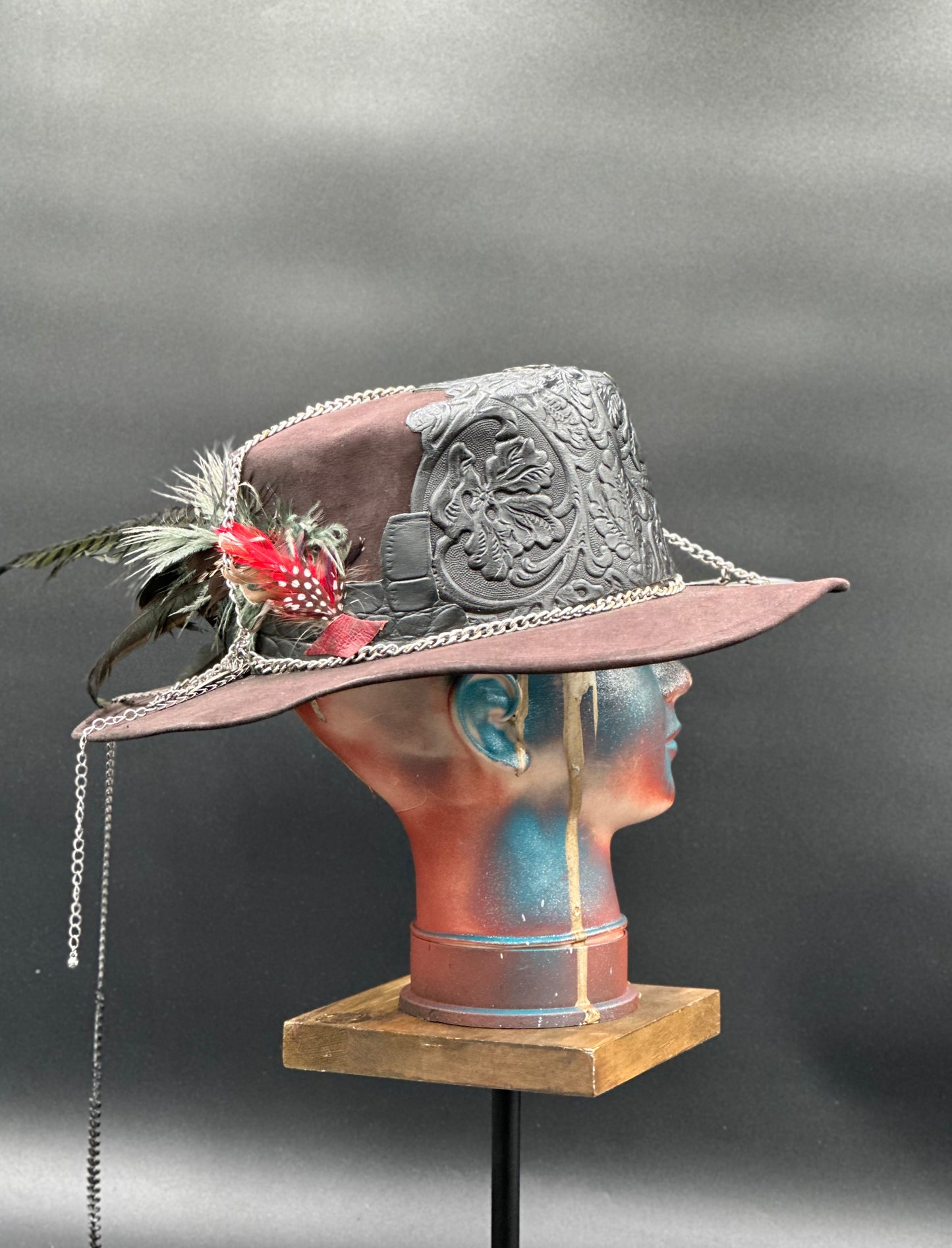 Angled view of the Algarve Black Cordobés Suede Hat, displaying the texture of the suede