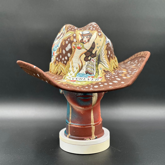 American Traditional Brown Cowboy Hat with hand-painted silver drops and tattoo design, front view.