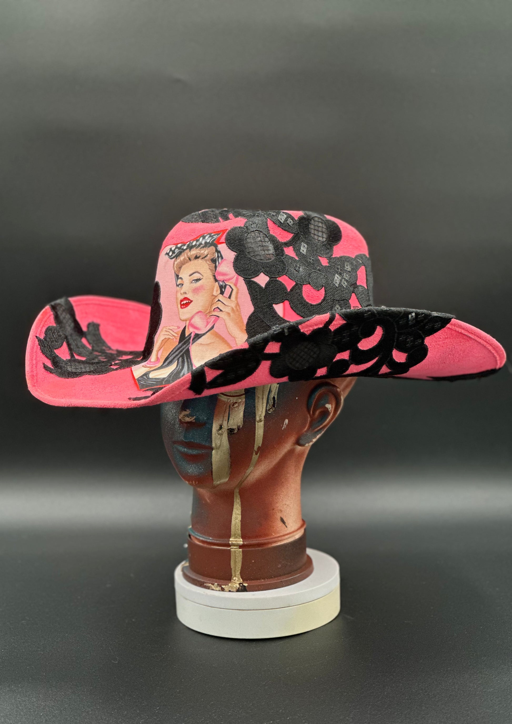 Side view of the L.A. Pinup Girl Hot Pink Suede Hat, showcasing the intricate lace collage.