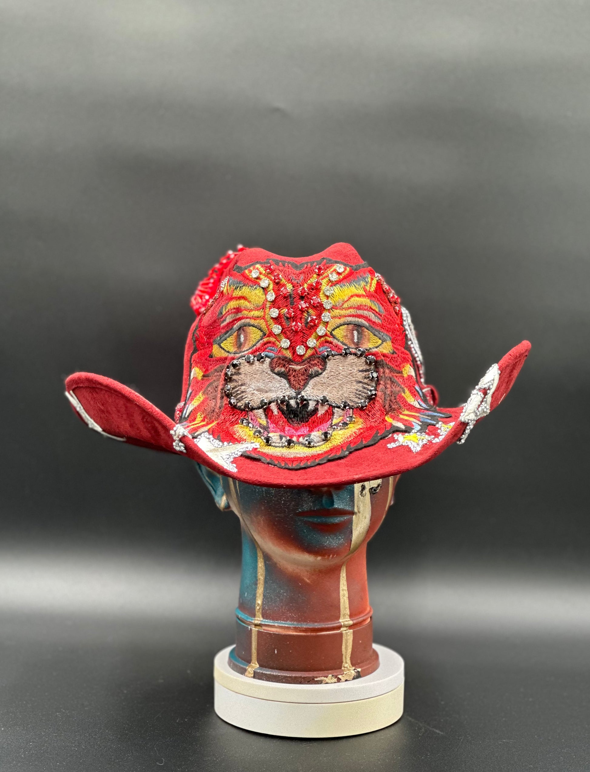 China - Red Suede Cowboy Hat with tiger embroidery, front view.