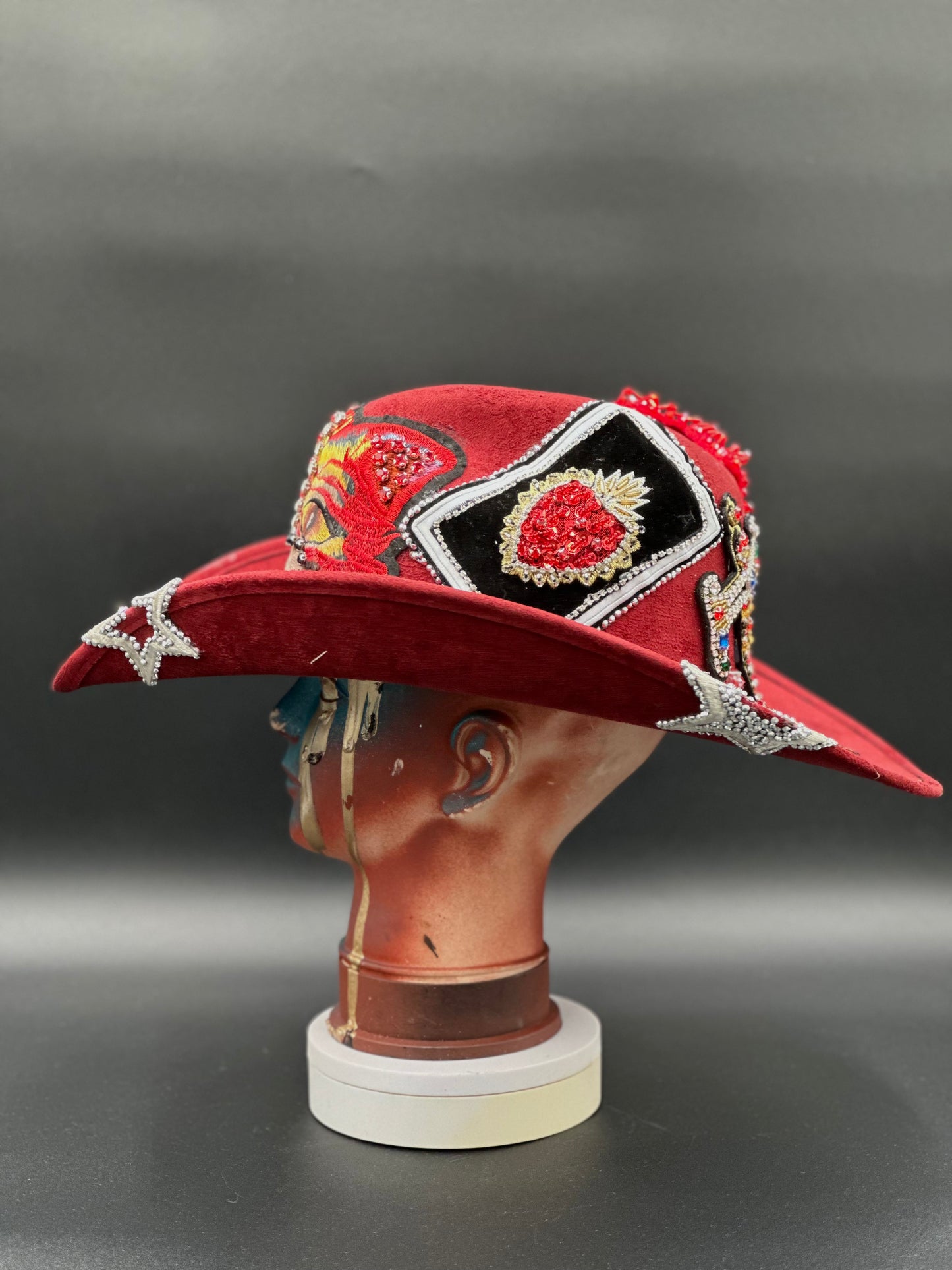 Side view of the China - Red Suede Cowboy Hat.