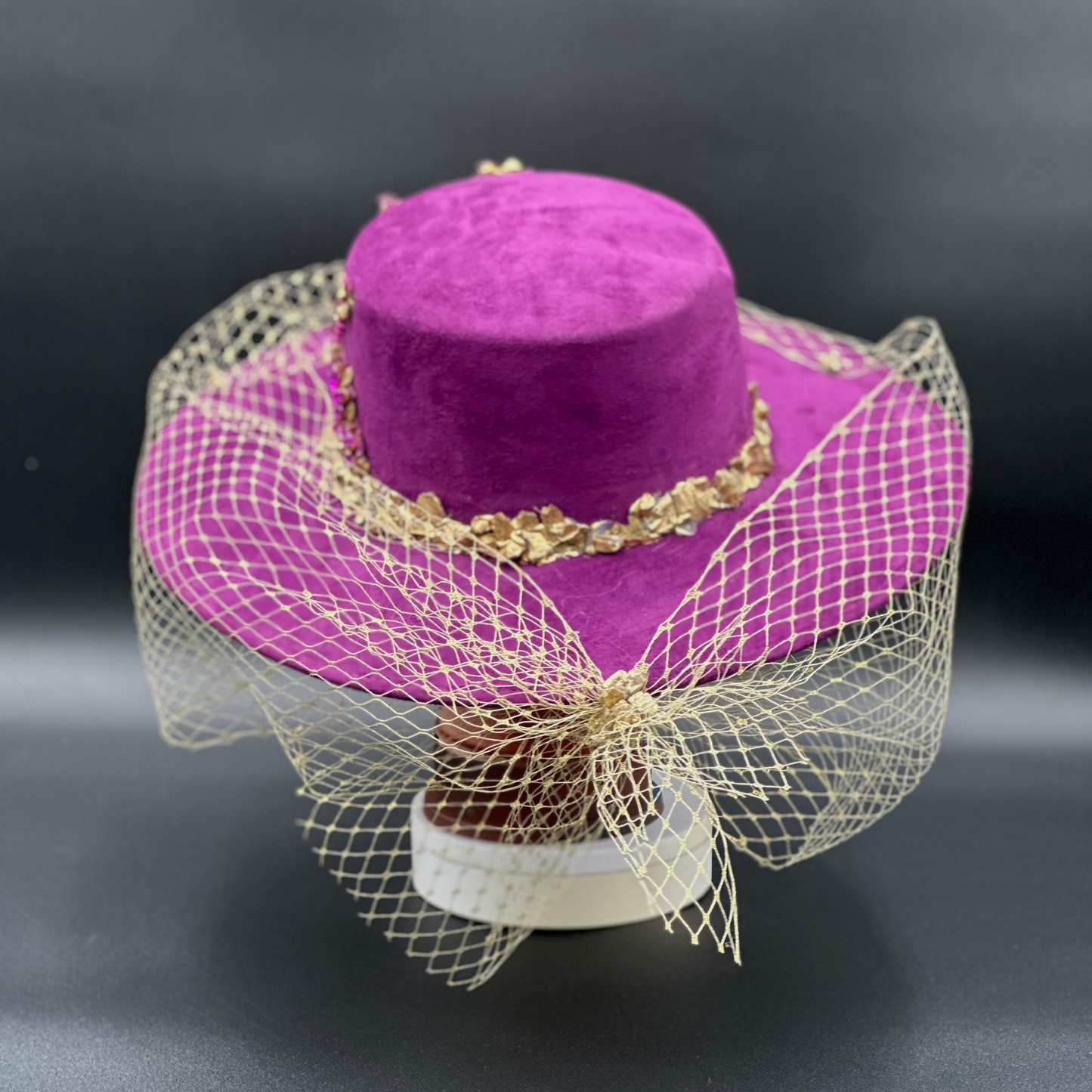 Back view of the France Magenta Cordobés Wool Hat on a mannequin head, showing the full design and details from the rear.