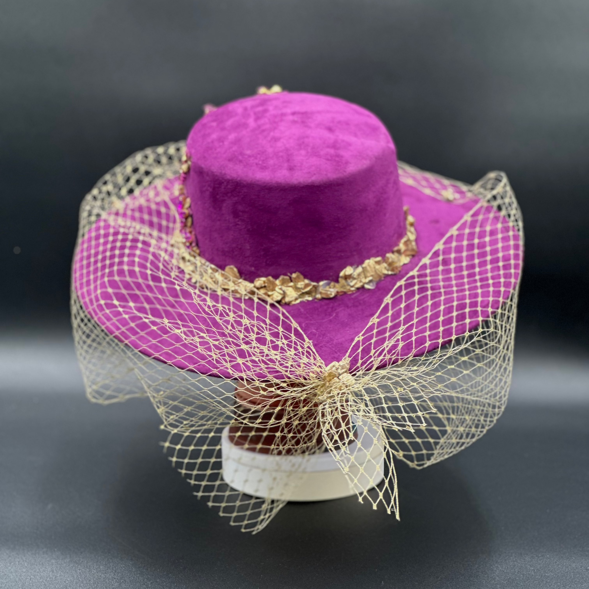 Back view of the France Magenta Cordobés Wool Hat on a mannequin head, showing the full design and details from the rear.
