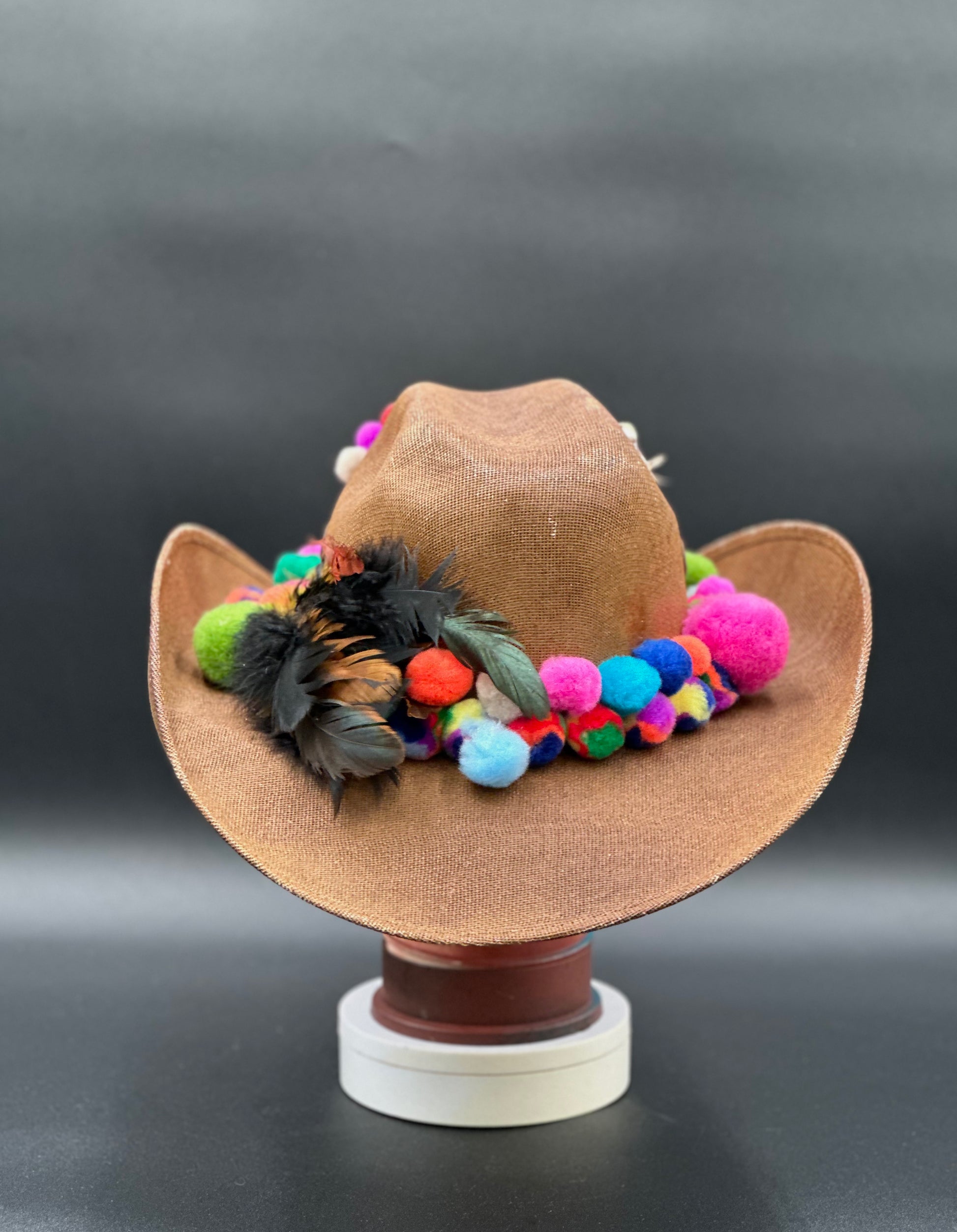 Back view of the Frida in Cotton Cowboy Hat on a mannequin head, showing the full design and details from the rear.