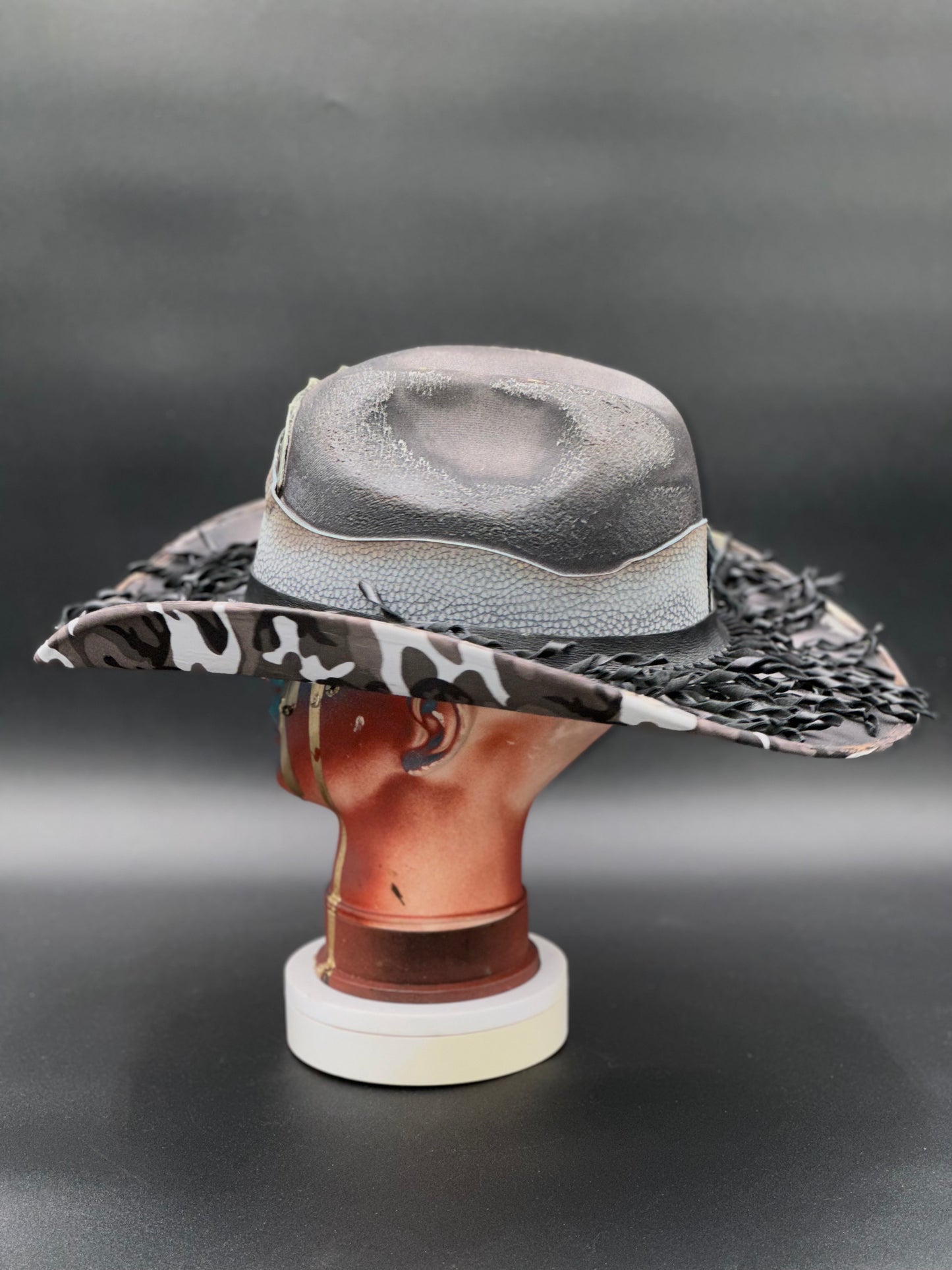 Nashville Gray Wool Cowboy Hat on a mannequin head, showcasing the hat's unique style and textured details.