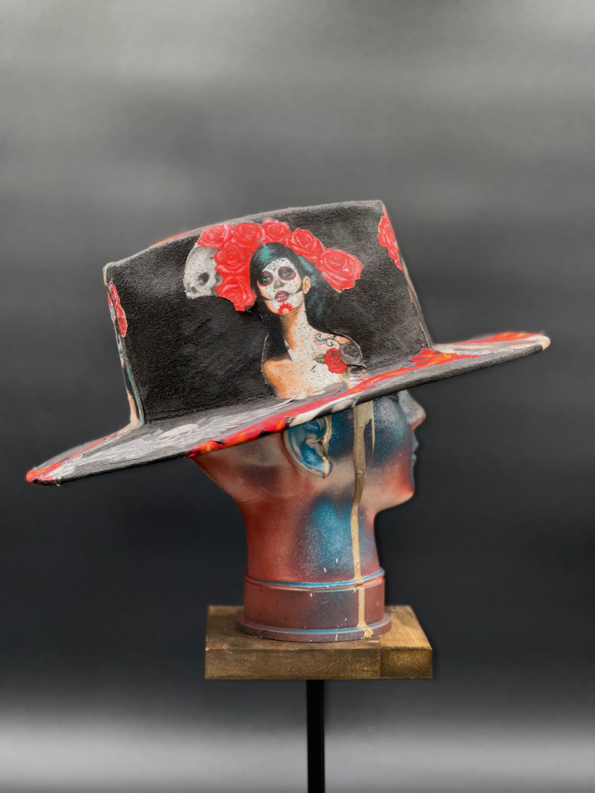 Side view of the Mazatlán Black Suede Arrow Hat on a mannequin head
