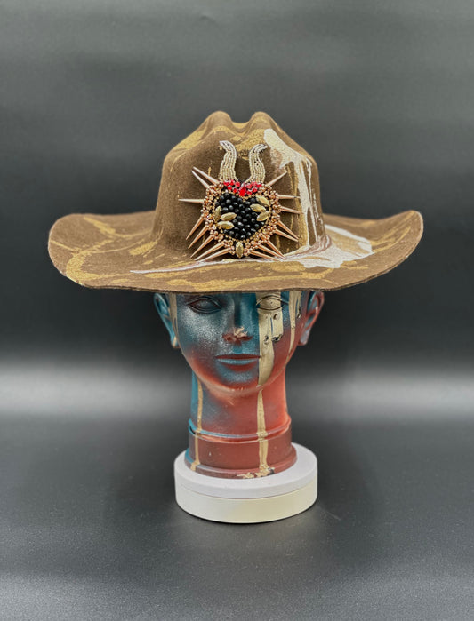 North Carolina Tobacco Wool Cowboy Hat with pearl and gold accents and a heart-shaped spike detail displayed on a mannequin head. Front view showing the hat's full design and shape.