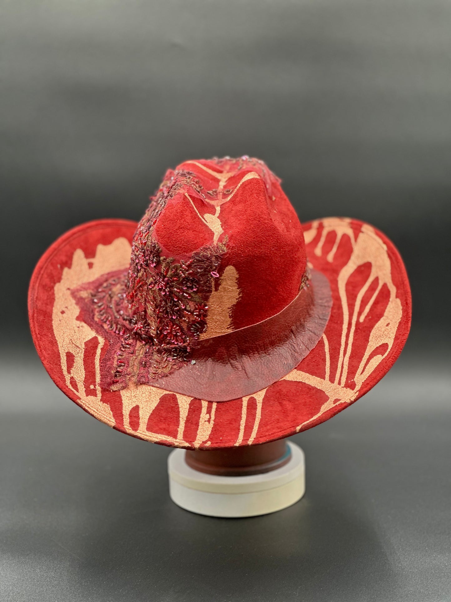 Back view of the North Miami Red Suede Hat on a mannequin head, showing the full design and details from the rear.