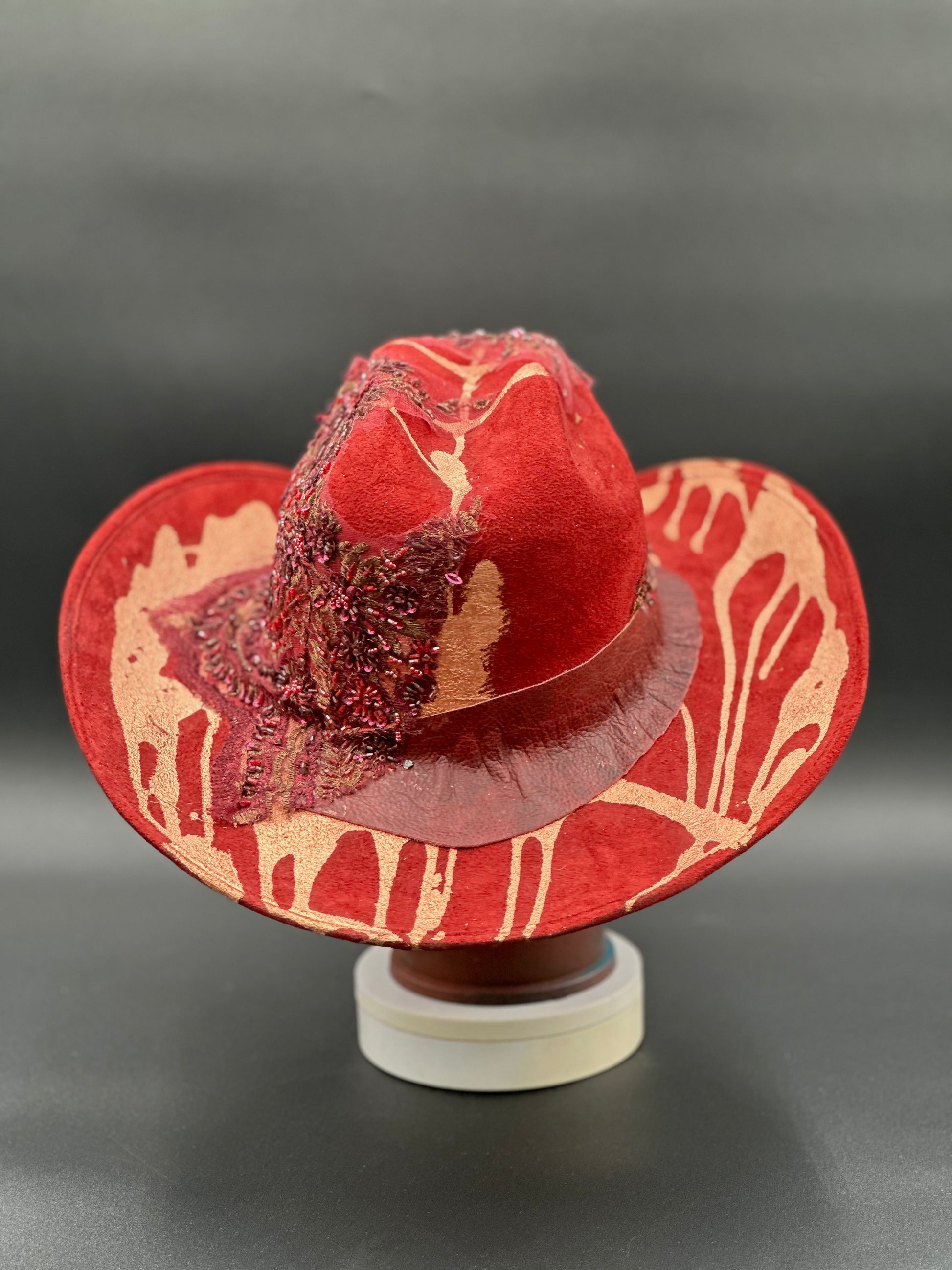 Back view of the North Miami Red Suede Hat on a mannequin head, showing the full design and details from the rear.