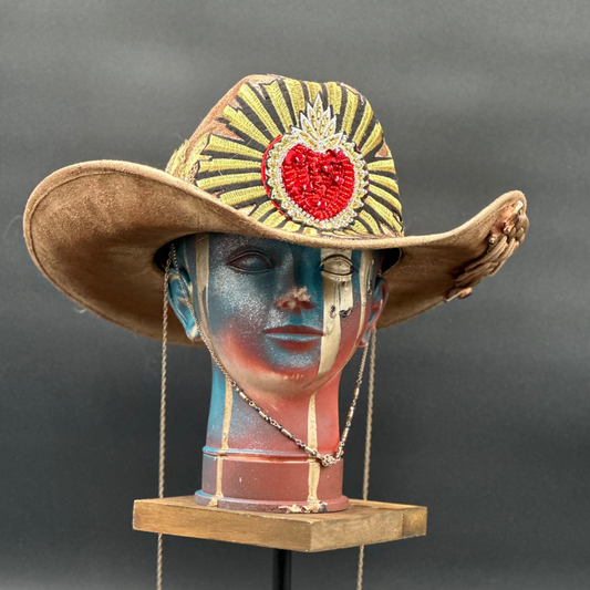 Portugal - Caramel Suede Cowboy Hat with hand-painted crystal accents and a crystal composition displayed on a mannequin head. Front view showing the hat's full design and shape.