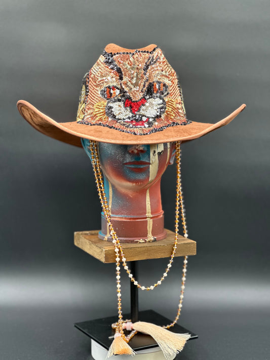 Tennessee Camel Suede Cowboy Hat with an embroidered tiger centerpiece and a crystal chain displayed on a mannequin head. Front view showing the hat's full design and shape.
