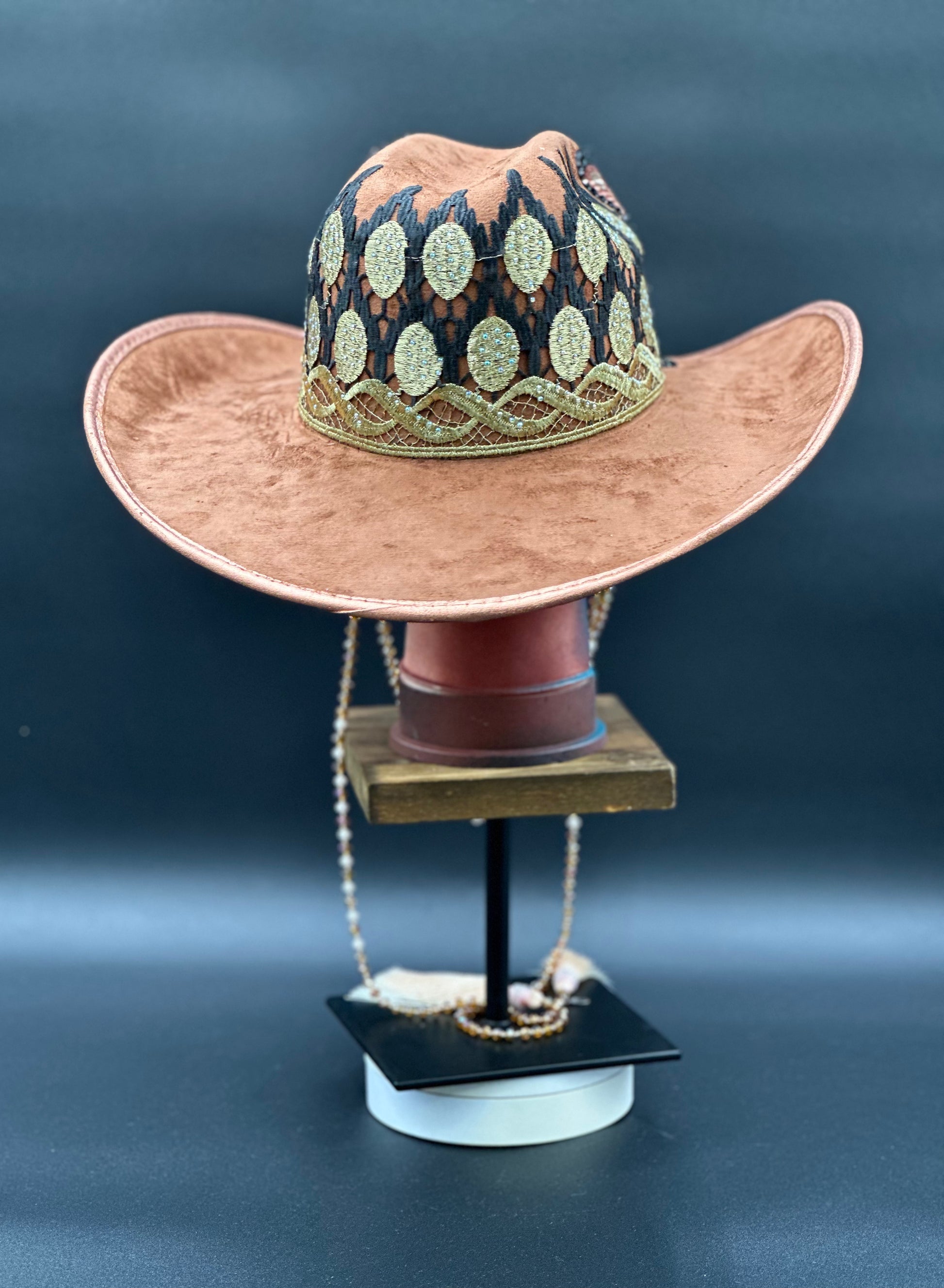 Back view of the Tennessee Camel Suede Cowboy Hat on a mannequin head, showing the full design and details from the rear.