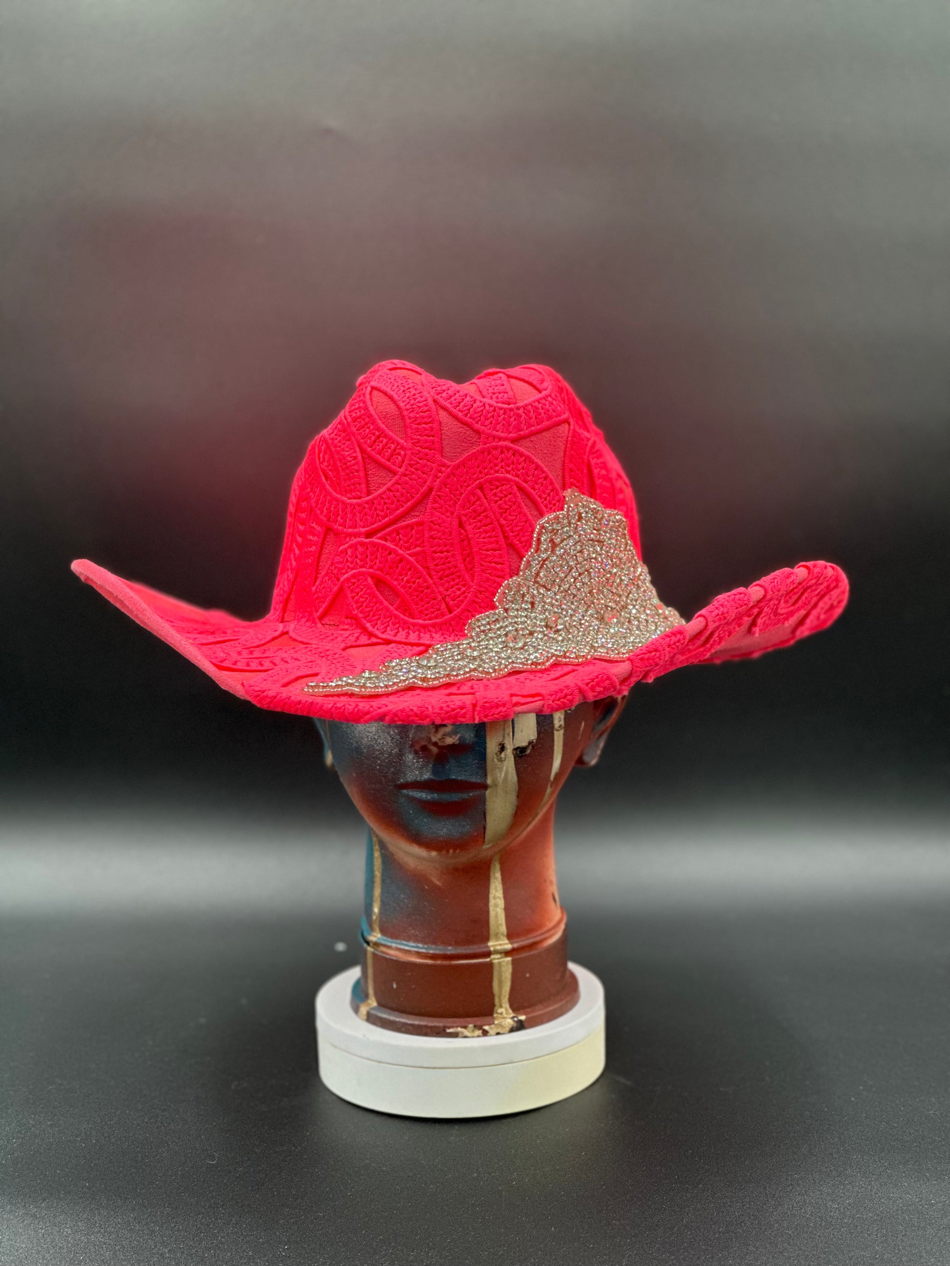 Texas Blink Hot Pink Suede Cowboy Hat with Swarovski crystals, front view, showcasing vibrant pink suede and intricate weave.