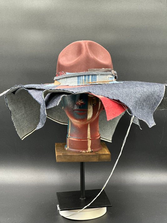 Totally Me Tobacco Ranger Hat with layered denim and leather, showing a wide brim and unique fabric textures. Front view of the hat on a mannequin head.