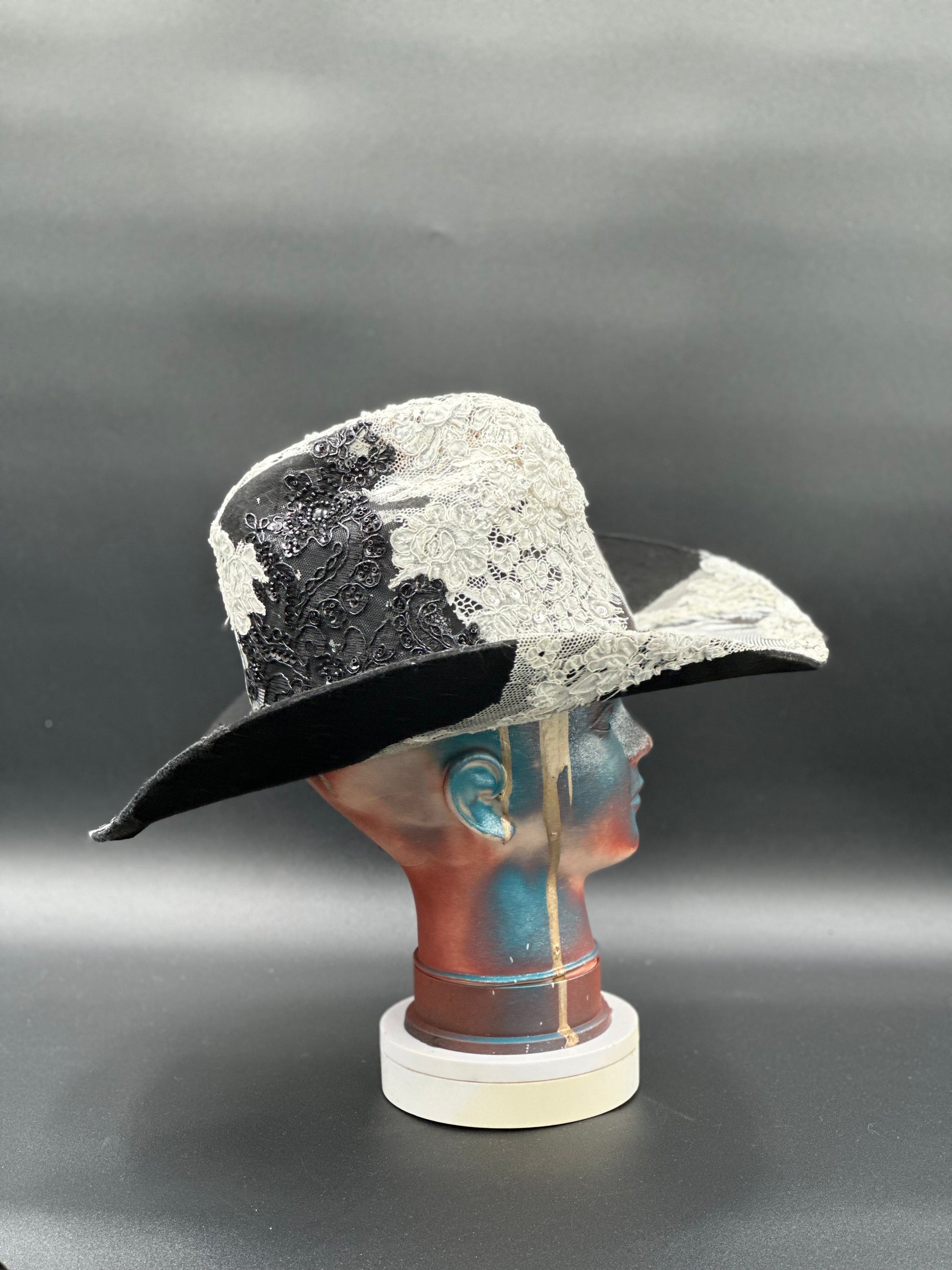 Side view of the Wedding of Frida and Death Cowboy Hat, highlighting the unique charm placement and the hat's shape.