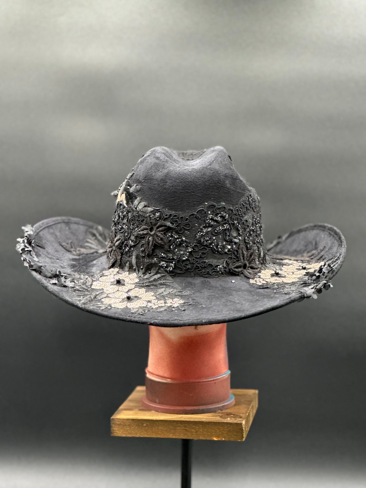 Back view of the Zorro Black Suede Cowboy Hat on a mannequin head, showing the full design and details from the rear.