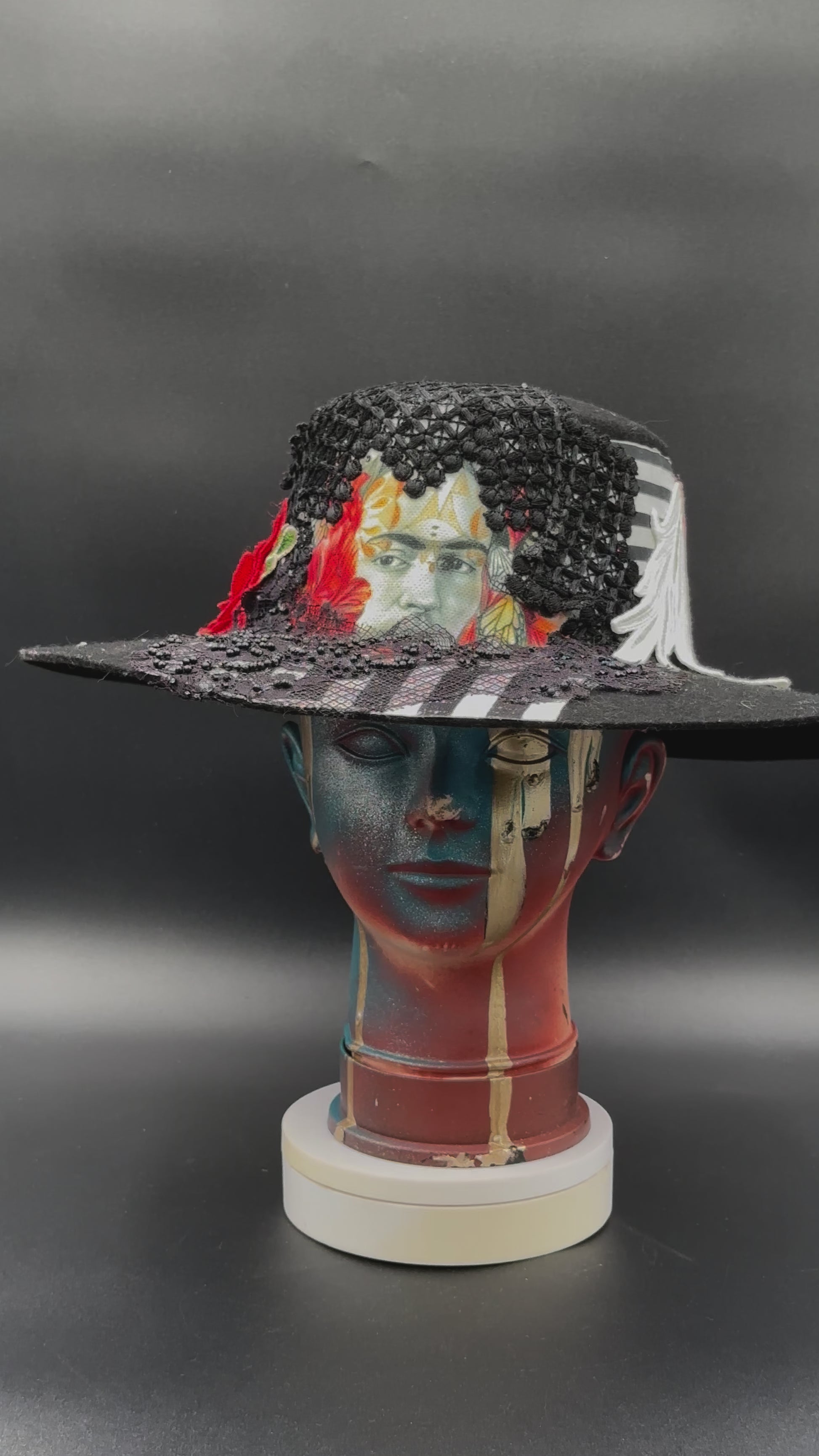 360-degree video of the Coyoacán Frida Kahlo Black Wool Cordobés Hat rotating on a mannequin head, showcasing the hat's full design and details from all angles.