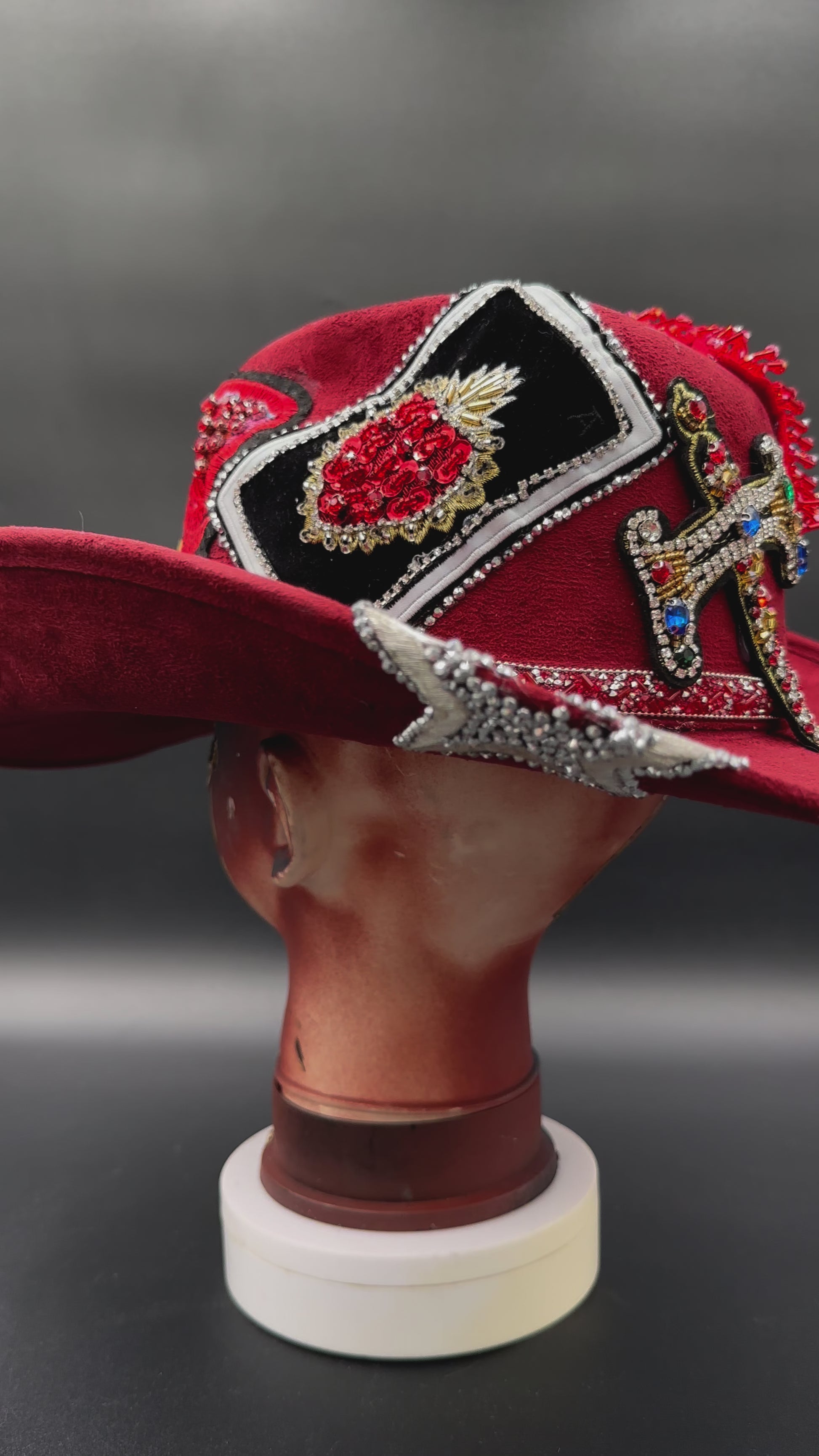 360-degree view of the China - Red Suede Cowboy Hat, showcasing its design from all angles.